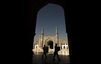 Election workers carry ballot boxes to a polling station at the Friday Mosque in Herat, Afghanistan, Wednesday, Aug. 19, 2009. Afghans will head to the polls on Aug. 20 to elect a new president. (AP Photo/Saurabh Das)