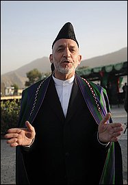 Afghan President and incumbent in presidential elections Hamid Karzai speaks to the media during Independence Day celebrations at the Defence Ministry compound in Kabul, Wednesday, Aug. 19, 2009. Afghans will go to the polls to vote for a new president Thursday. (AP Photo/Massoud Hossaini,Pool)